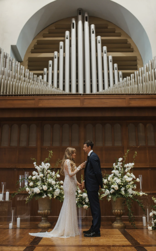 Bride and groom exchange vows in the Cappella Ballroom located in La Crosse, Wisconsin.